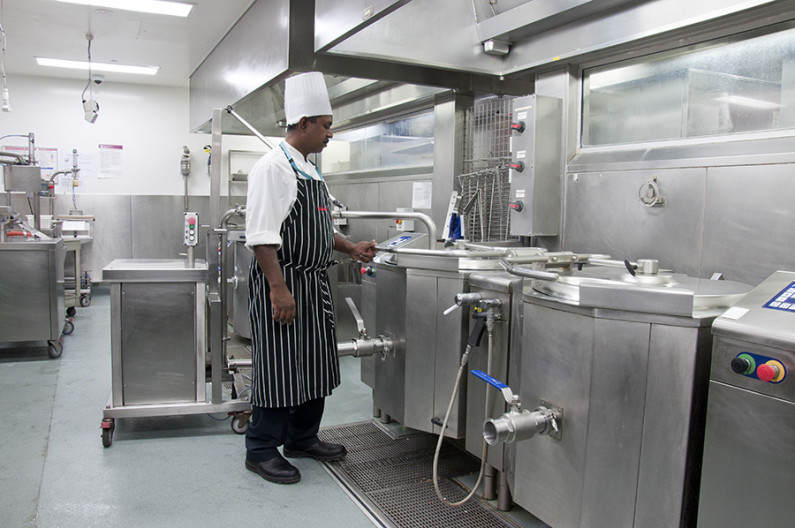 Chef at Work in Production Kitchen